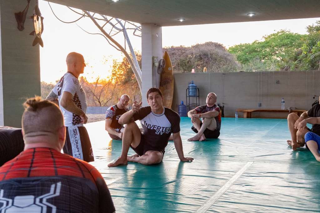 Nelson teaching on an open-air mat at sunset during the Mexico retreat