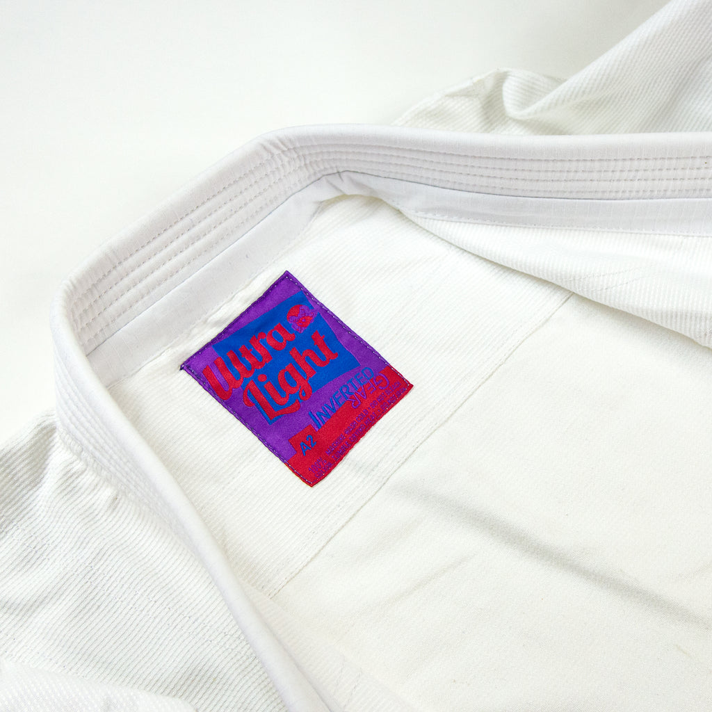 2023 White Ultra Light Pearl Weave Gi